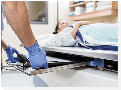 Pixxgen flat panel detector being used to image patient in rad room