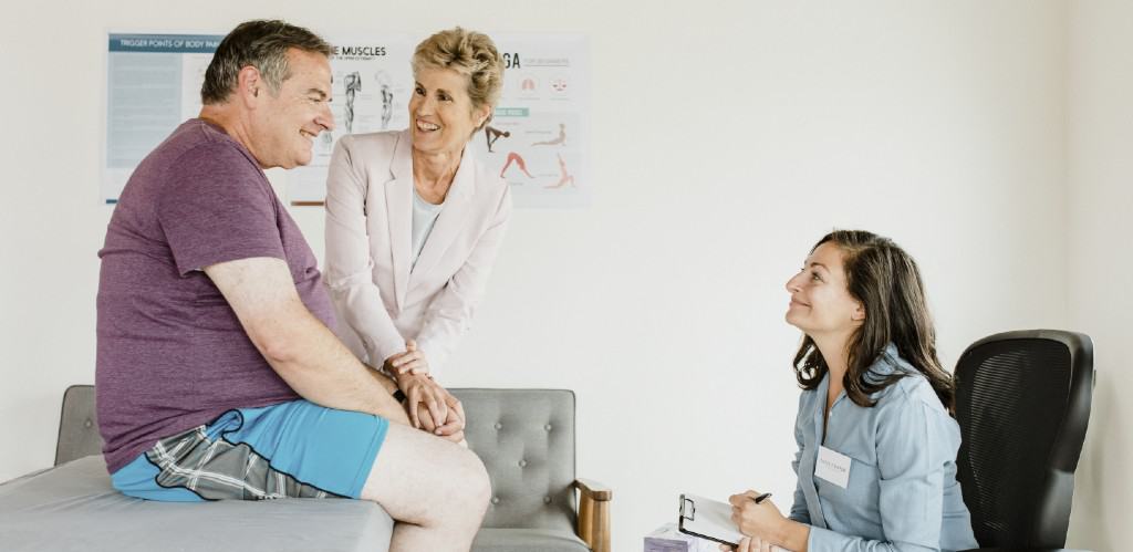 Bariatric patient talking to doctor