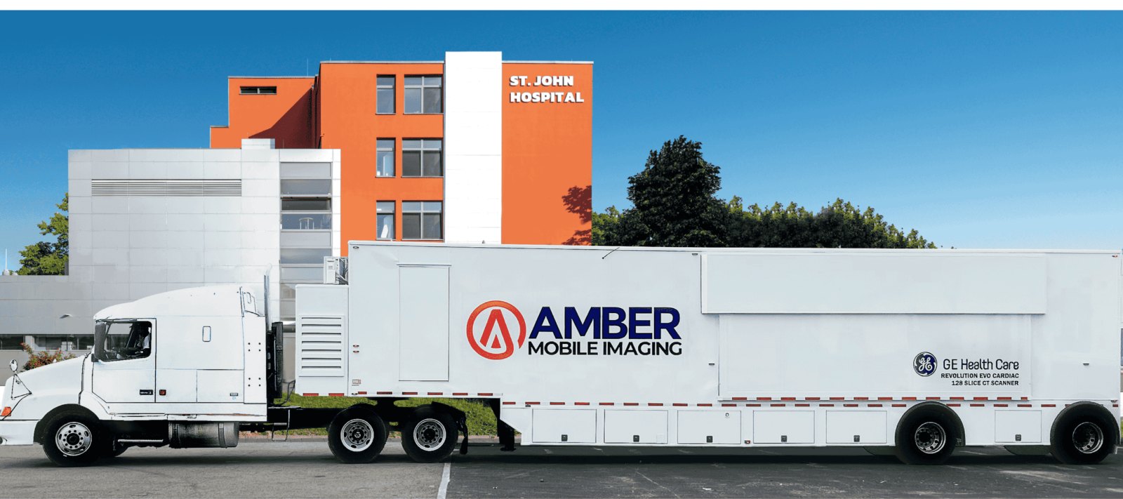 Amber Mobile Imaging CT coach parked at a hospital campus